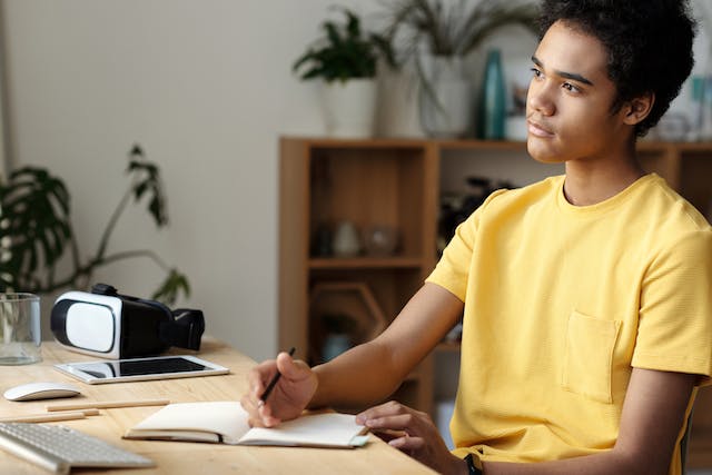 male student studying