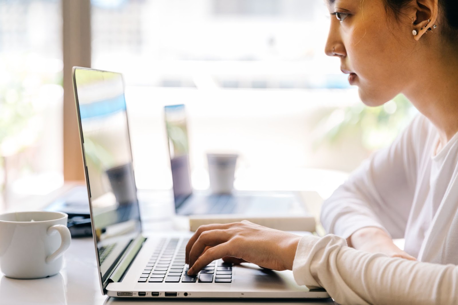 female student working on laptop